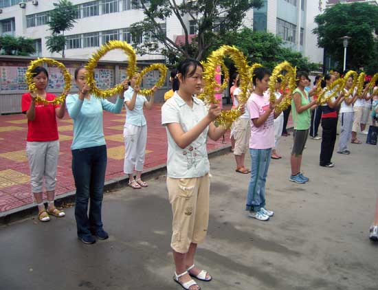 2005 - We are greeted by No 2 Middle School students on our way to the dais for the official Celebration.The No 2 Middle School Historical Exhibition House is to the left.