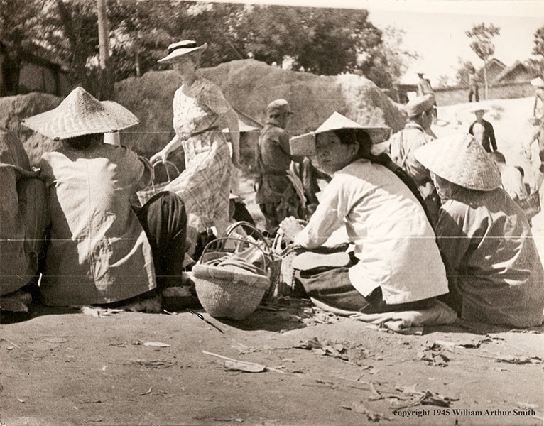 bartering with local Chinese after our liberation